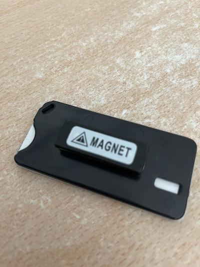 Image of the back of a flap with a drop of resin